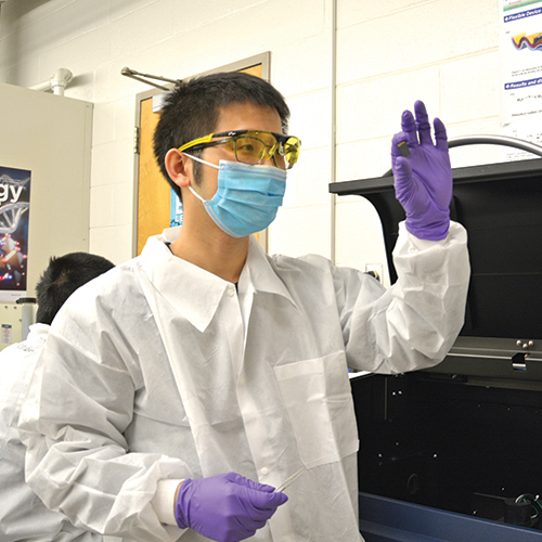 Kai Wang, assistant research professor, works with materials that can be inserted into next generation solar cells to improve their efficiency.