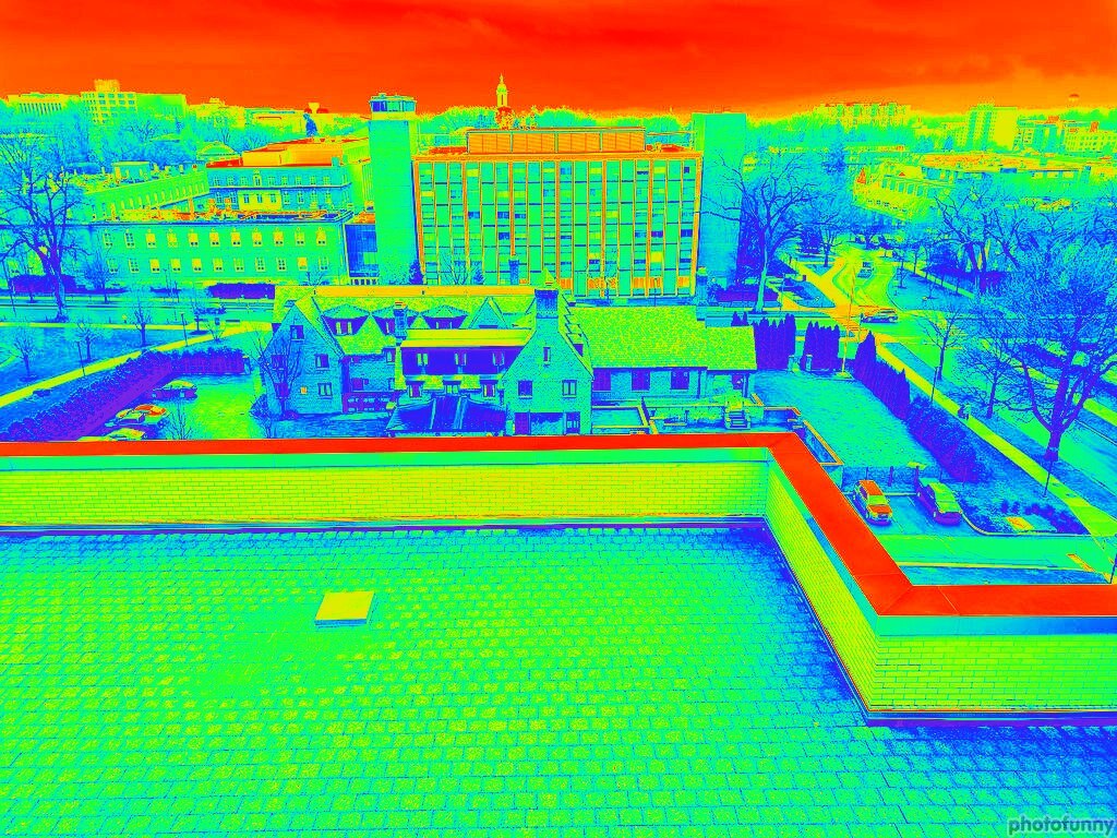 decorative colorful red, blue, and green image of buildings on campus
