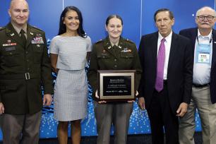 Michelle Kokoski, center, received the Lt. Michael P. Murphy Award