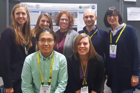 Guido Cervone (back row, second to right) with students and postdoctoral scholars from his lab at a recent AGU fall meeting.