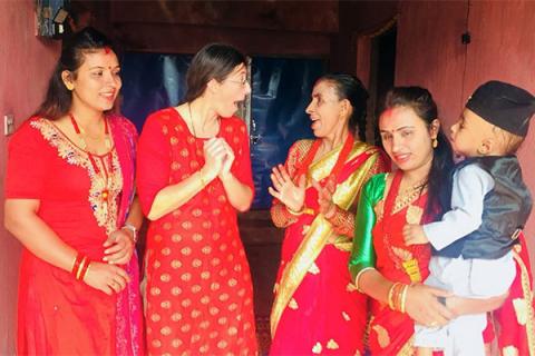 Marie Louise Ryan, second from left, celebrates Dashain in Lamjung, Nepal