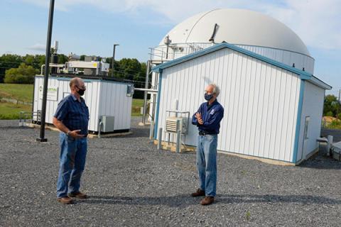 Tom Richard (right) at Penn State’s anaerobic digester facility