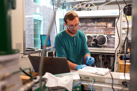 Ryan Fair, doctoral candidate in materials science and engineering, conducts research into cold sintering. 