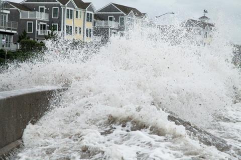 Storm surge batters a coastal area. 