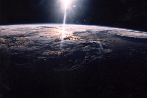 Sunlight over Earth as seen by STS-29 crew onboard Discovery, Orbiter Vehicle (OV) 103.