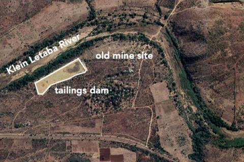 Satellite image of gold mine tailings dam (outlined in white) next to the Klein Letaba River in the Limpopo Province