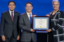 Shimin Liu, middle, was recognized with the Rossiter W. Raymond Memorial Award by SPE