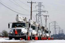 Trucks lined up to respond to power outages