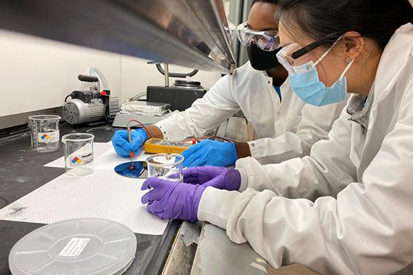 Penn State researchers work in a lab