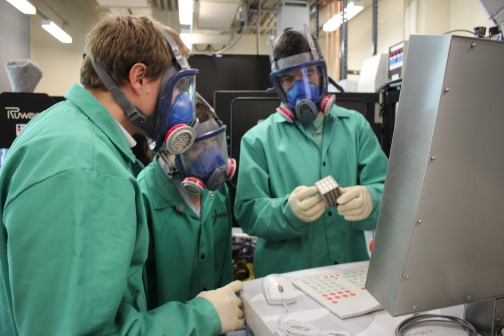 Students work in one of the University's additive manufacturing labs. 