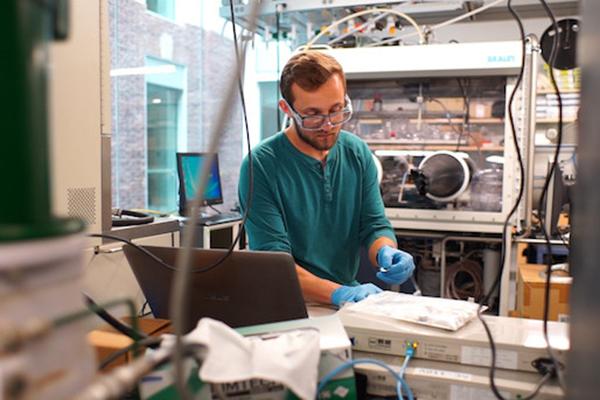 Ryan Fair, doctoral candidate in materials science and engineering, conducts research into cold sintering. 