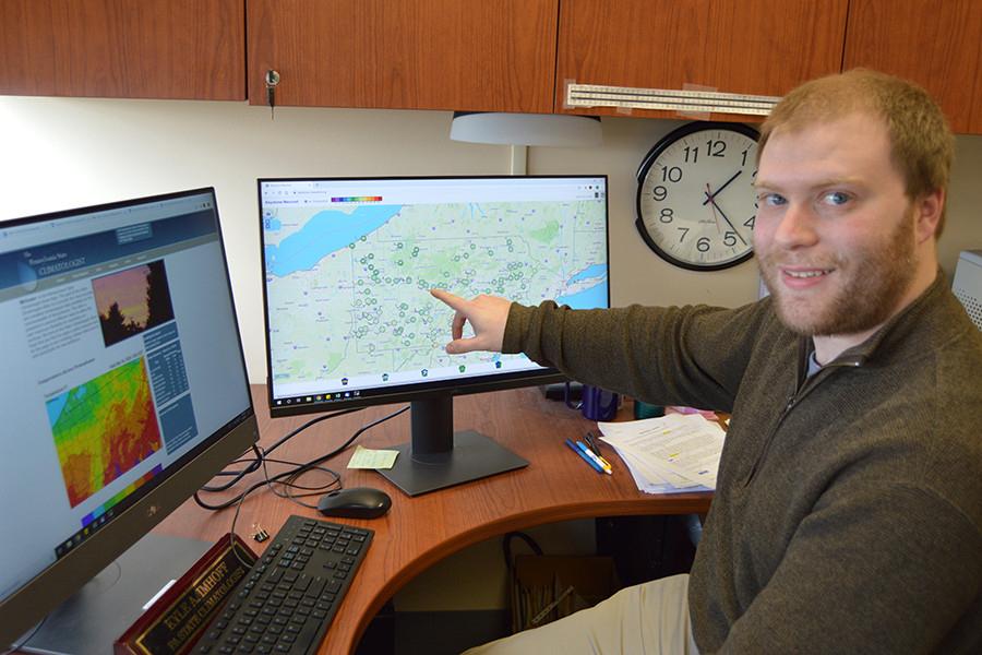 Kyle Imhoff, the Pennsylvania state climatologist, explaining weather data.