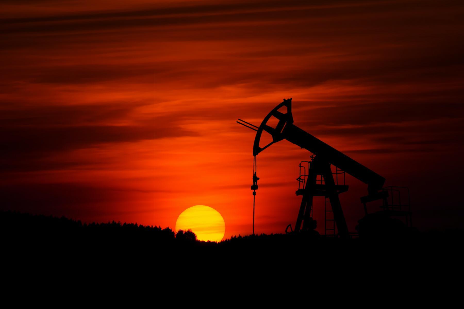 An oil well at sunset 
