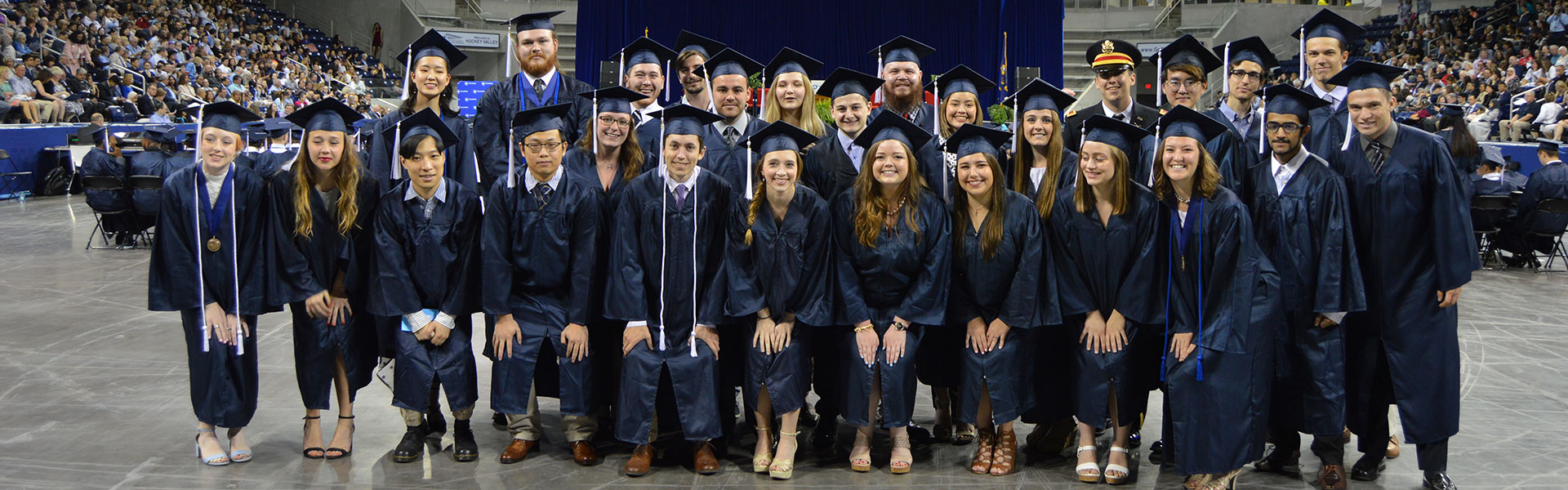 Geosciences students in a group at 2018 commencement ceremony