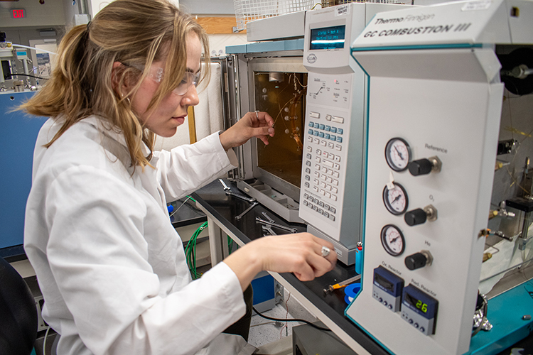 Student operaing lab equipment