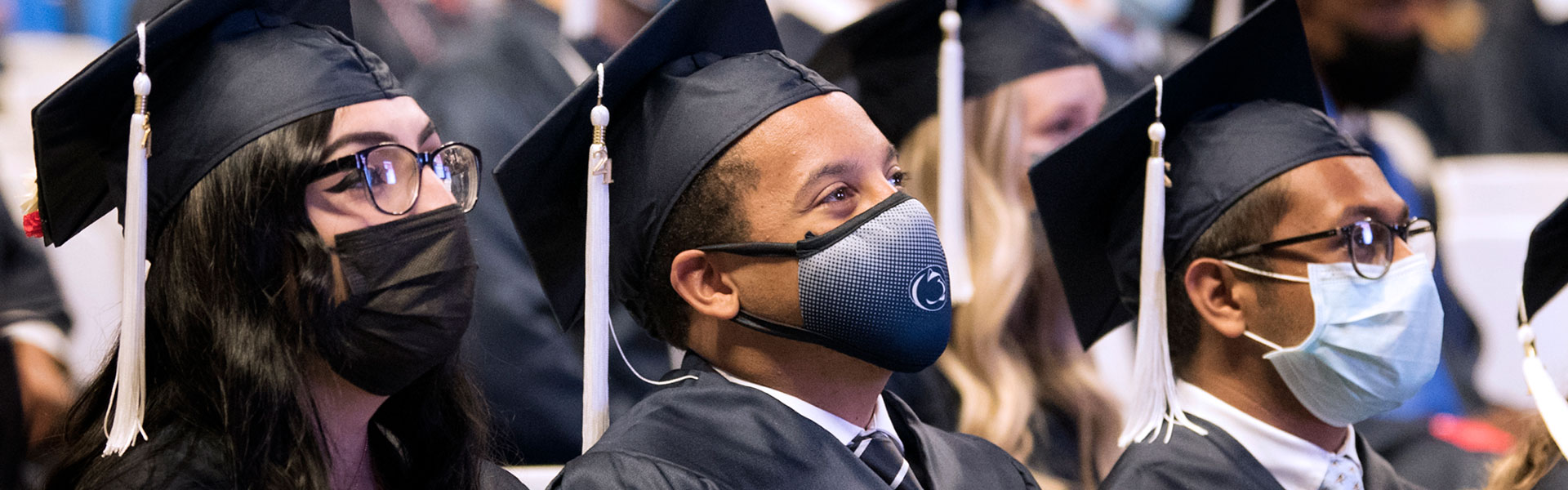 Students wearing facemasks at 2020 graduation