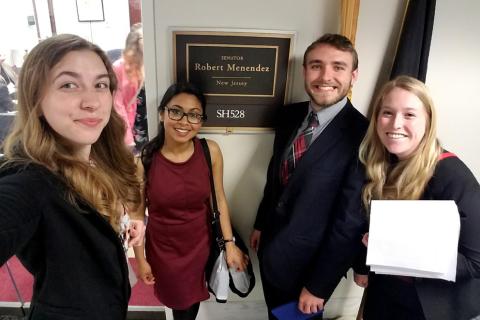 Tom Nigl, third from left, and fellow members of Penn State's Science Policy Society, speak with members of U.S. Congress