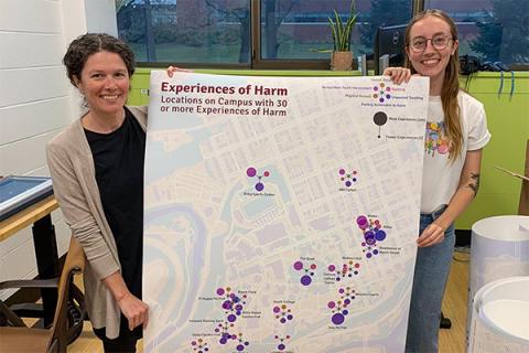 Dana Cuomo and Lily Houtman display campus safety map