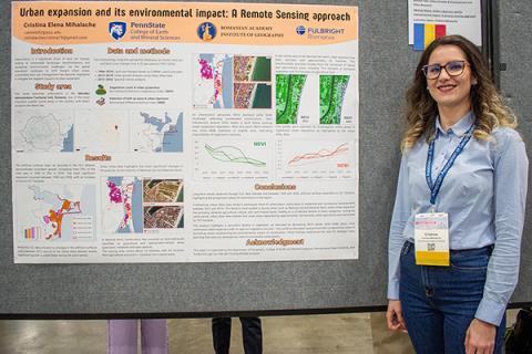 Cristina Elena Mihalache presents her research poster at the American Association of Geographers annual meeting on Wednesday, March 26, in Detroit, Michigan.