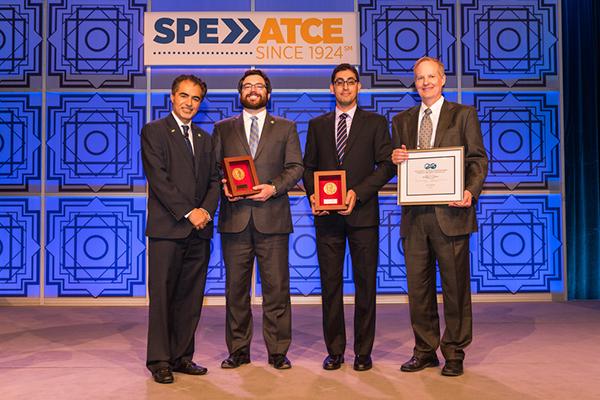Sami Alnuaim presents Michael Cronin, Hamid Emami-Meybodi and Russ Johns with awards