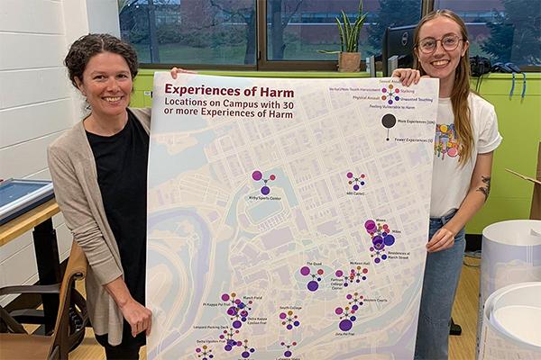 Dana Cuomo and Lily Houtman display campus safety map